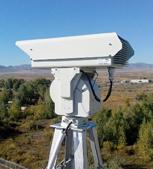 Long-range PTZ on a tower over open country and water