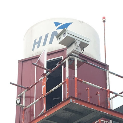 Close view of an airport EO/IR and radar pedestal